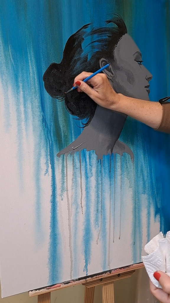 artist hand drawing on canvas a female figure